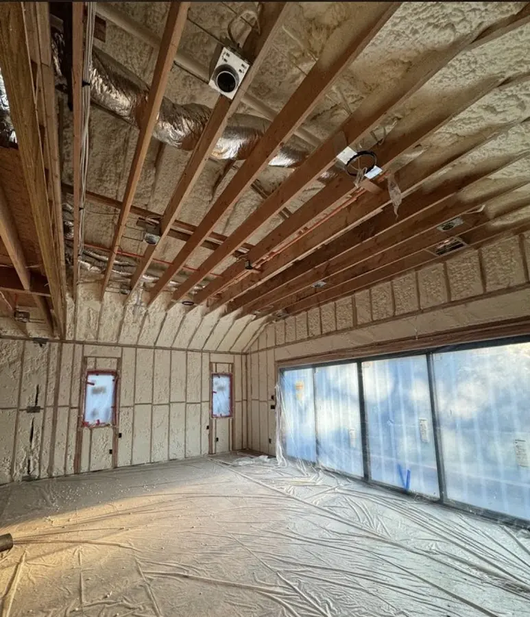 Interior walls and ceiling insulated with spray foam during new construction in Los Fresnos